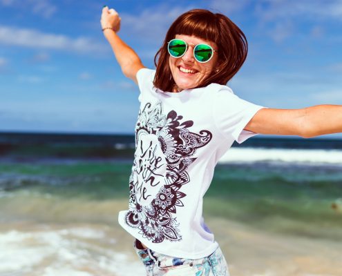 woman jumping sunglasses